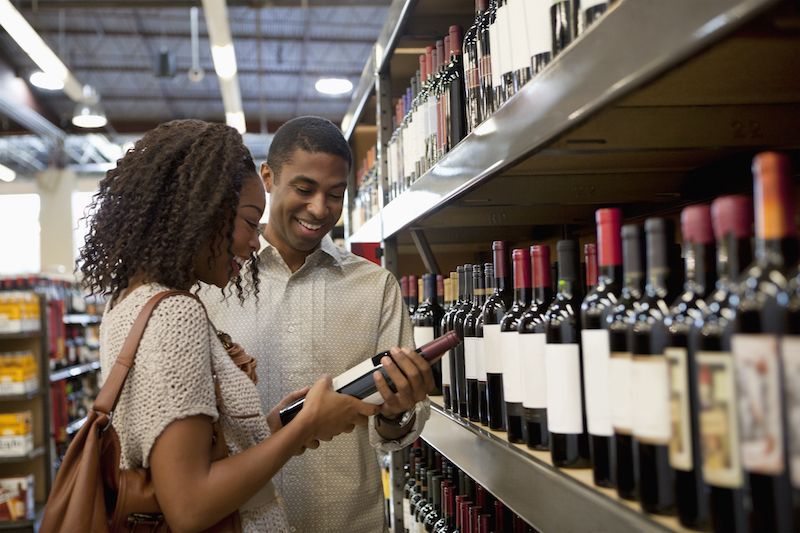 Man and woman choosing wine